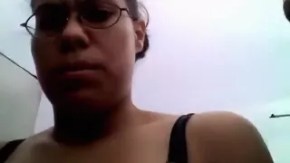 Dude rubs his latina gf's shaved pussy on top of a building