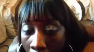 ebony girl gives her boyfriend  a teasing blowjob