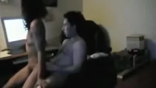 ebony girl with small tits and hairy pussy rides her white boyfriend  reverse cowgirl on the office chair in the bedroom