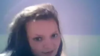 girl phones with her bf, while masturbating with a dildo on her bed.