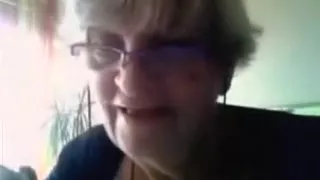 Granny has cybersex with a stranger on cam and flashes her big boobs