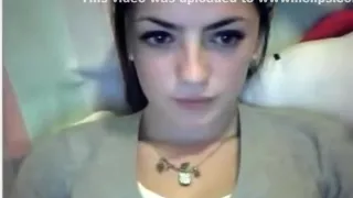 Hot brunette girl plays with her big tits and shaved pussy on her bed