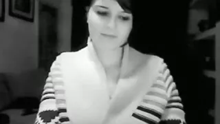 Hot brunette girl plays with her tits and masturbates on the sofa