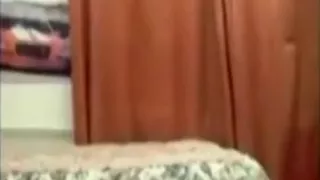 Hot brunette girl strips and touches her naked body teasingly