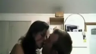 hot brunette gives her boyfriend  a good sucking on the bed