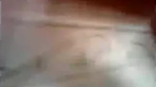 Latina fingers her hairy pussy in the shower