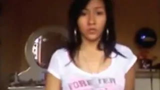 latina girl strips for her boyfriend  on cam and masturbates