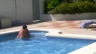 Mature couple fucks in the pool on vacation