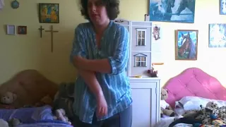 Nerdy chubby girl strips, rides a pillow and fingers her pussy standup.