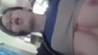 Nerdy girl with glasses plays closeup with her big tits and shaved pussy