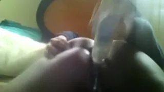 Nerdy glassed ebony girl masturbates her pussy and ass with a vibrator closeup