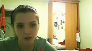 Ponytailed girl sets up the webcam and makes her first sextape