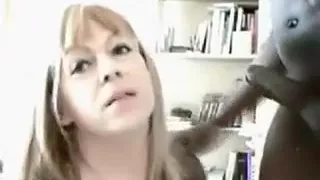 Delightful golden-haired sucks and bonks a dark ramrod.