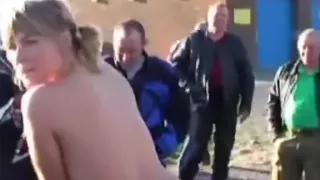 A hot older chick goes walking outside undressed