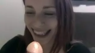 Amature redhead sucks large cock