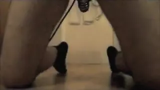 miniature chastity cage and stimulating prostate with buttplug