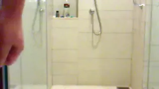 Clumsy serf beneath shower
