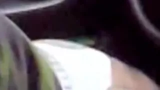 Stroking in car in a cruise area