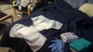 Cathed and Changin a Juicy Diaper