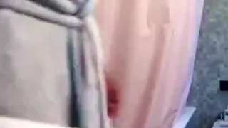 Undressed shower in washroom