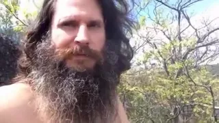 Undressed on a mountain with an excellent view