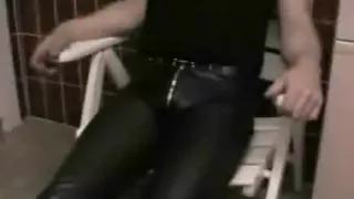 Pissing and cumming in laced leather jeans