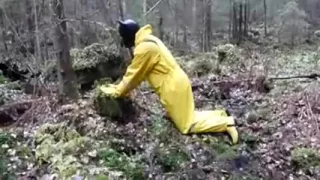 Raingear puppy with a friend outdoors