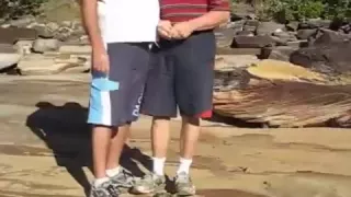 Boardshort grope at the beach