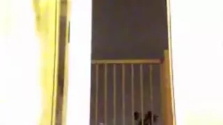 Buttplug on balcony while crossdressing