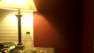 Ginger nude on bed, playing with dildo