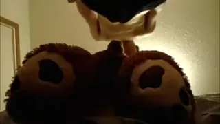 Fucking a giant stuffed teddy bear with condom