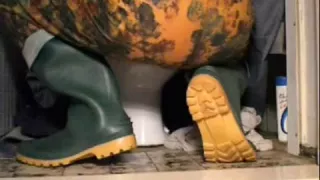 nlboots - green boots and camo overalls on toilet