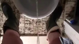 nlboots - pissing and smoking on toilet in rubber boots