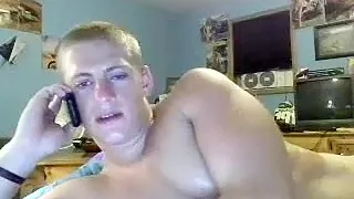 Handsome boyfriend is relaxing in the apartment and filming himself on web cam