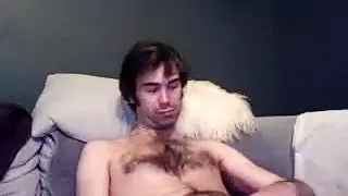 Sweet homosexual is having a good time in the apartment and filming himself on web cam