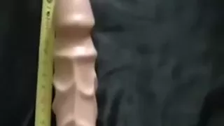 A big sex toy between the overweight a-aperture cheeks of my wife