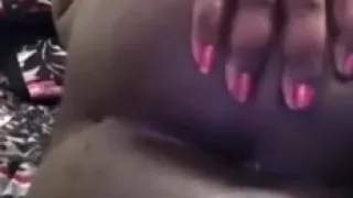 large glamorous woman ebon woman rubs her fur pie on web camera as we movie scene chat