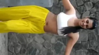 Captivating and sexy cutie dancing in her hot outfit shaking her booty