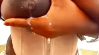 Busty ebon enchantress demonstrates her milky boobies