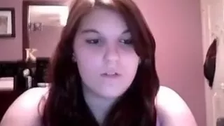 Busty redhead beauty on web camera wishes to know my opinion