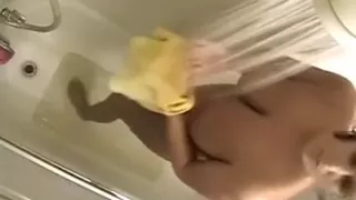 Catching my busty darksome brown sweetheart in the bathtub washing