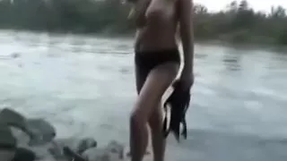 My curvaceous milfie wife strips near the river