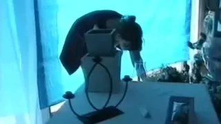 My sexy wife in the garage flashes her milk sacks on the video