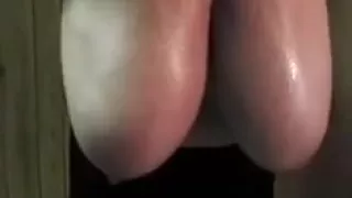 My wife pulls out and swings her enormous oiled up titties