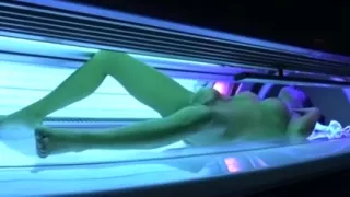 Consummate busty dark brown hair chick in the solarium bare on hidden camera