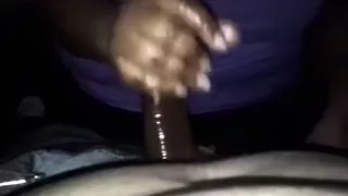 Playing with a black shiny oiled up strapon of my boyfriend