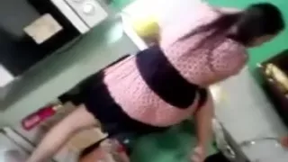 Glamorous girl with slim sexy body is shaking her arse on camera