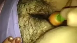 Stuffing a carrot in my hirsute large adorable woman snapper on closeup home episode scene