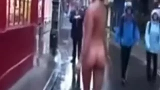 Walking stripped down the street like an way-out exhibitionist