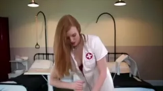 White busty British nurse gets undressed and caresses her sexy body